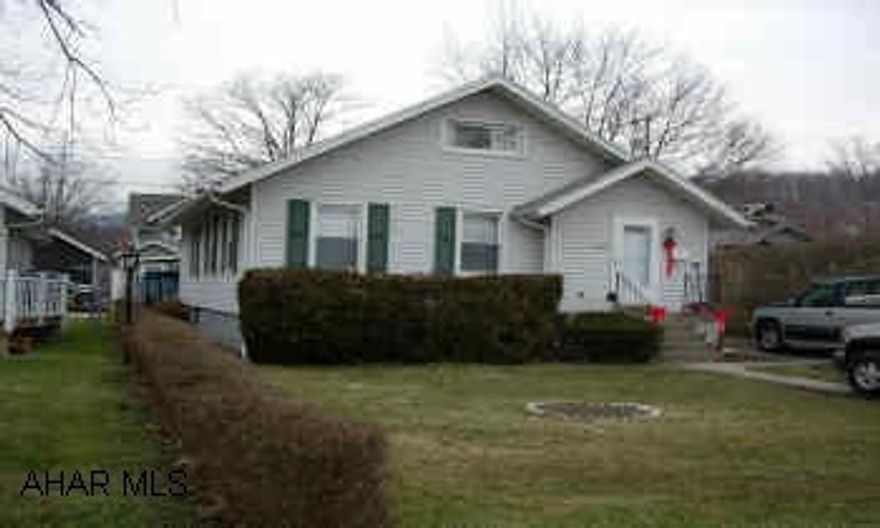 Alley access, 2 car garage, 2 car carport, and a driveway.    Convenient Location!  Well Maintained. Lots of parking.