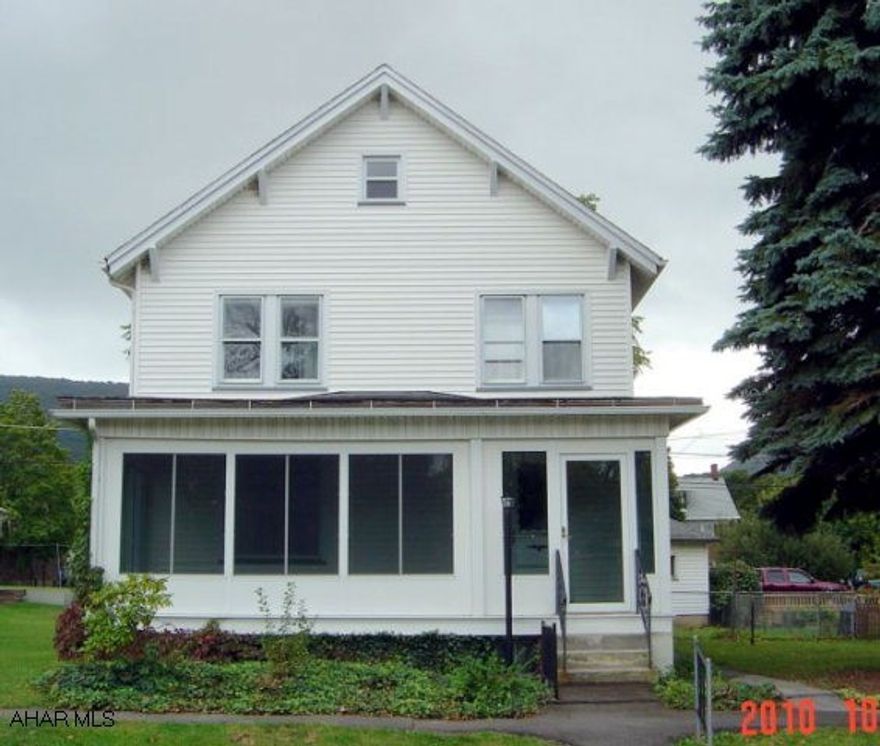 East End - Spacious 4 BR, 2 BA, LR, F/DR, window seat, Eat-In Kitchen, Pantry, 1st floor full Bath, Attic Storage, Enclosed front porch/sunroom, 2/C Garage, Vinyl siding, double lot fenced, walnut tree.  Newer furnace, electric and 2nd floor windows. $59,900