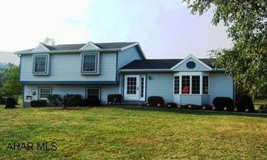 SPLIT LEVEL IN GREAT CONDITION SITTING ON LEVEL LOT. 1.8 ACRES. BEAUTIFUL SETTING WITH LARGE BACK PATIO. MASTER BR, DECK, INVITING KITCHEN, 3 BRS, 1.75 BATHS, UNFINISHED FAMILY ROOM. LARGE SHED.