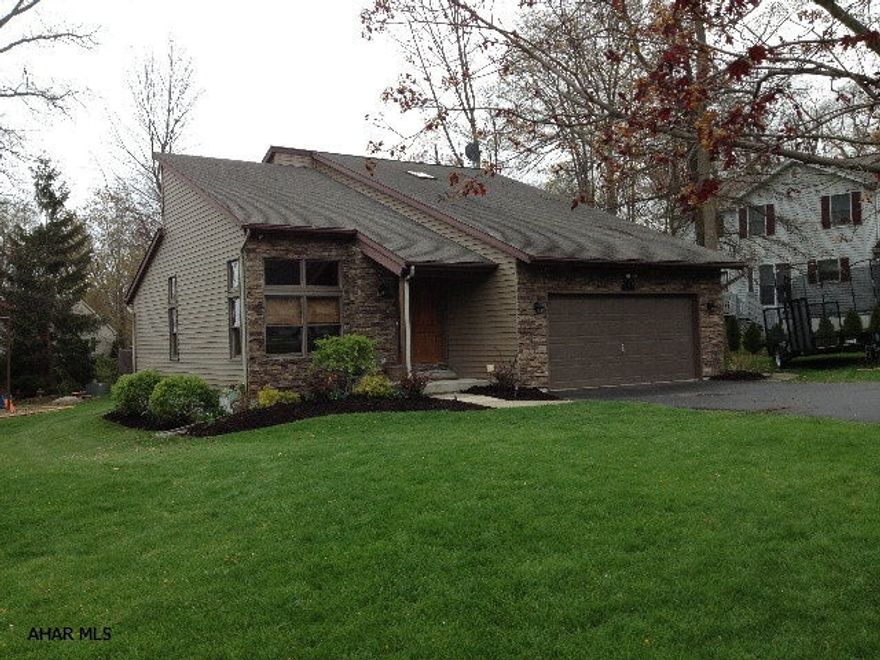 Everything has been done. Finished lower level has a bonus rm = bedroom, office, exercise area?..family room with space for everyone. New insulation, stack stone & new vinyl. All new floors, carpets, countertops, faucets and lights. Custom shower in master bath. Wired for a generator and plumbed for a gas fireplace. Nicely landscaped...it's move in ready!! The kitchen was just upgraded with an new backsplash. Great location!!