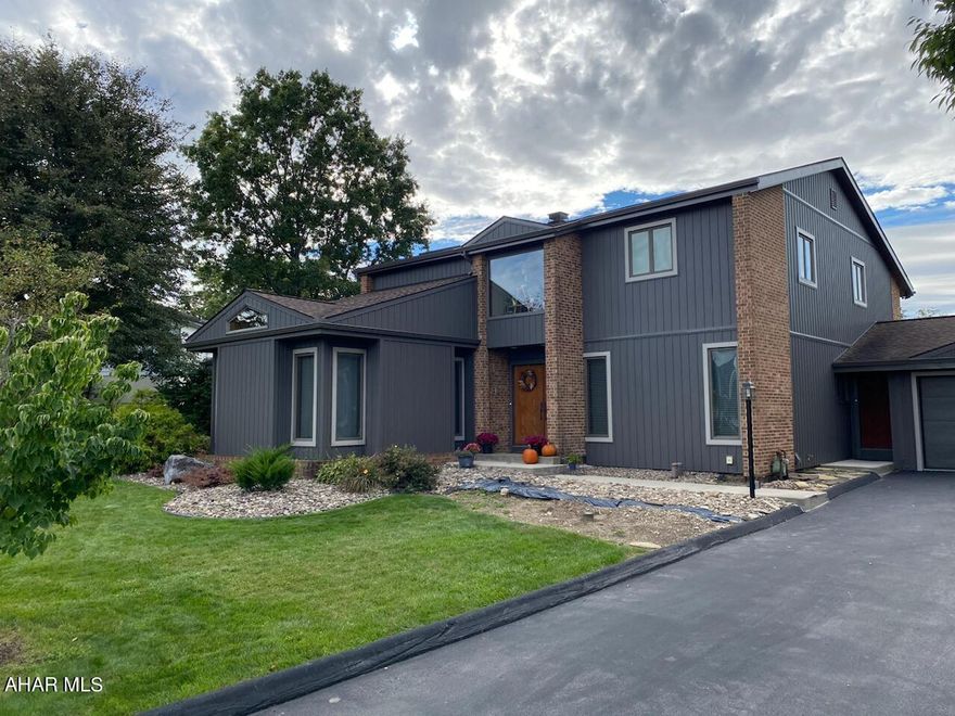 Check out this gorgeous spacious home with newer siding in Hollidaysburg School District. It is nestled in a quiet cul-de-sac in Penn Farms. With four bedrooms, three full baths, and two half baths, this residence offers versatility and functionality for any lifestyle or occasion. The focal point of the living space is a breathtaking fireplace, gracing the living room with warmth and charm, creating an inviting ambiance enjoyed from both the in-law suite and the living room. The in-law suite features a spacious bedroom with a walk in closet, built-in storage, 1st floor laundry, a garden tub, sauna, and bathroom w/heated towel racks!
Step outside two of the bedrooms onto the private balcony overlooking the patio area, where you can entertain guests or simply unwind in the serene surroundings. Below awaits an in-ground heated pool, inviting residents to bask in leisure and relaxation. Convenience meets practicality with an attached four-car garage, providing ample space for vehicles and storage, ensuring every aspect of your lifestyle is accommodated seamlessly. From its stylish exterior to its thoughtfully designed interior, this exceptional residence offers a harmonious blend of modern amenities and timeless elegance. Call to schedule your showing today! 
Pre-approved buyers only. (Buyer to confirm taxes, sq footage, and lot size).