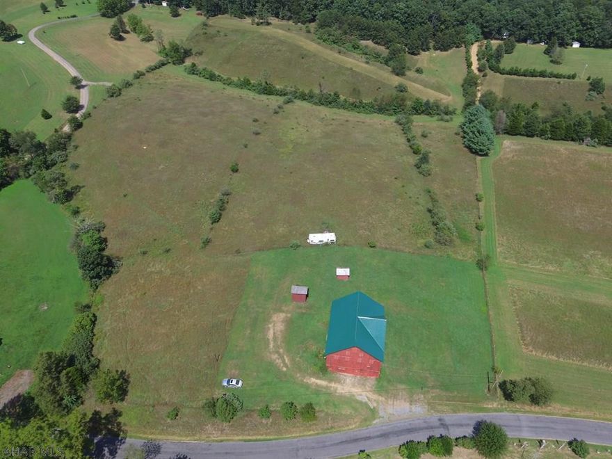 Nice building lot in the country with beautiful Mountain views. Property offers a 50'x45' bank-barn with 200 amp electric service and a well on site. Located near the PA/MD State Line with easy access to I-68.