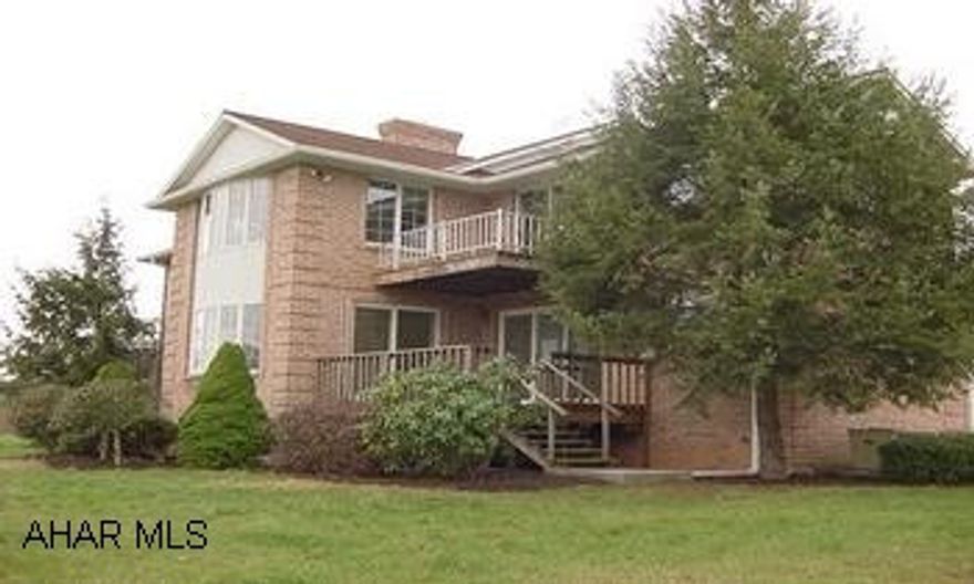 Terrific views in this 1986 built brick 2-story!  Large rooms, great setback line, 18.46 acres of solitude! Great quality in this 2-story brick built in 1986 and loads of room!  Refinished hardwood floors, newer carpeting, newer interior paint, central vac, some cedar-lined closets, combo furnace, two fireplaces, masters on ea floor w/full baths, laundry on each floor, central air, 2 decks, terrific views!  Originally constructed as a double and could be easily converted to a single.  Two dining rooms, kitchens, great rooms, 4 bedrooms, 4 baths. Kitchen being installed on main floor!  One of a kind!