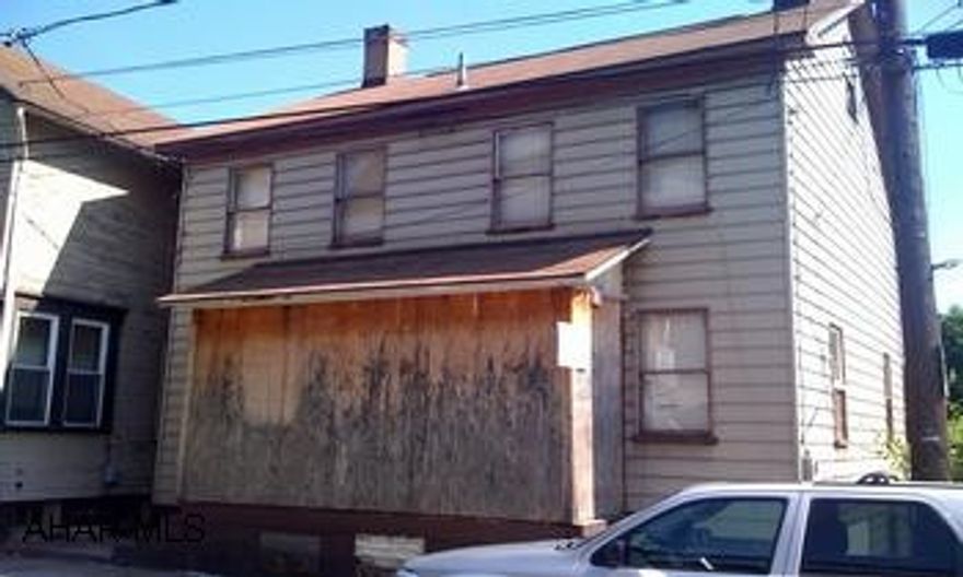 PRICED TO SELL! NEEDS TLC BUT GREAT POTENTIAL! NEWER FURNACE, PREVIOUSLY DUPLEXED