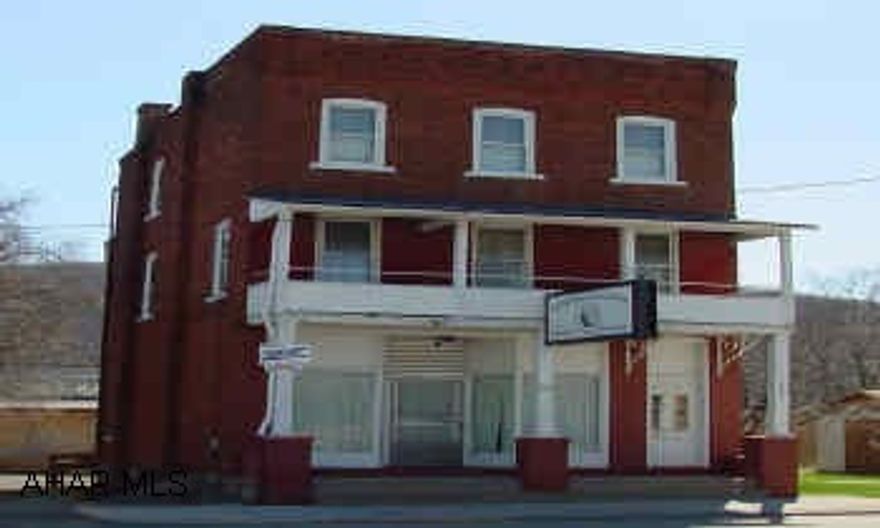 Two story brick bldg, ideal location for small business with  3 bedroom apt upstairs and off street parking. Two story brick bldg, ideal location for small business with  3 bedroom apt upstairs and off street parking