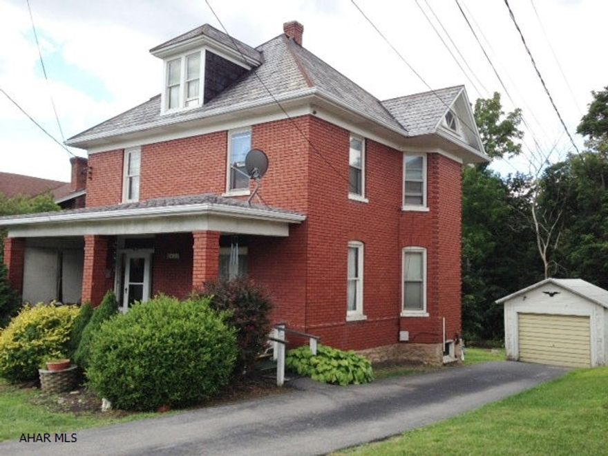 Very nice 2-story brick with stained-glass windows and some original wood trim.  Four bedrooms offer plenty of space.  Updated electric and newer furnace.  1-car garage with paved driveway.  Great location!