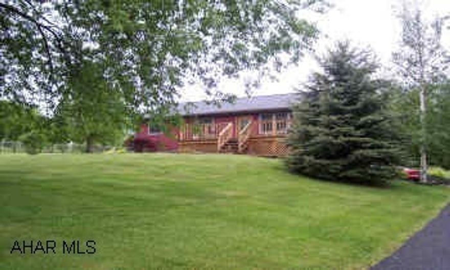 Nice ranch home on .716 acres finished basement open floor plan with cathedral ceiling one car heated garage. well kept