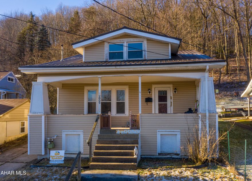 Major updates have just been completed on this spacious 3 bedroom, 2 full bath home with immense potential! This home is conveniently located just minutes away from Penn State Altoona. New metal roof, fresh paint, and original hardwood flooring throughout. Ample parking with a multi-car driveway and amazing views. There is a first floor master bedroom with a full bath. This home offers plenty of closet space as well. This would be a great investment property or primary residence for anyone.