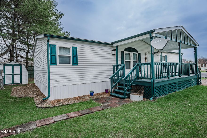 Perfect one-story living ''Move-In Ready'' located in Independence Place-a ''55+ Community''. This 3 bedroom 2 bath home has vaulted ceilings, gas fireplace, Eat in Kitchen & a Primary bedroom with double sinks, soaker tub & shower. New furnace& CA-2023, New roof 2022, new counter tops and kitchen flooring 2023. Newer windows, 2 sheds, covered front porch, yard and paved off street parking. (Park must approve buyer)