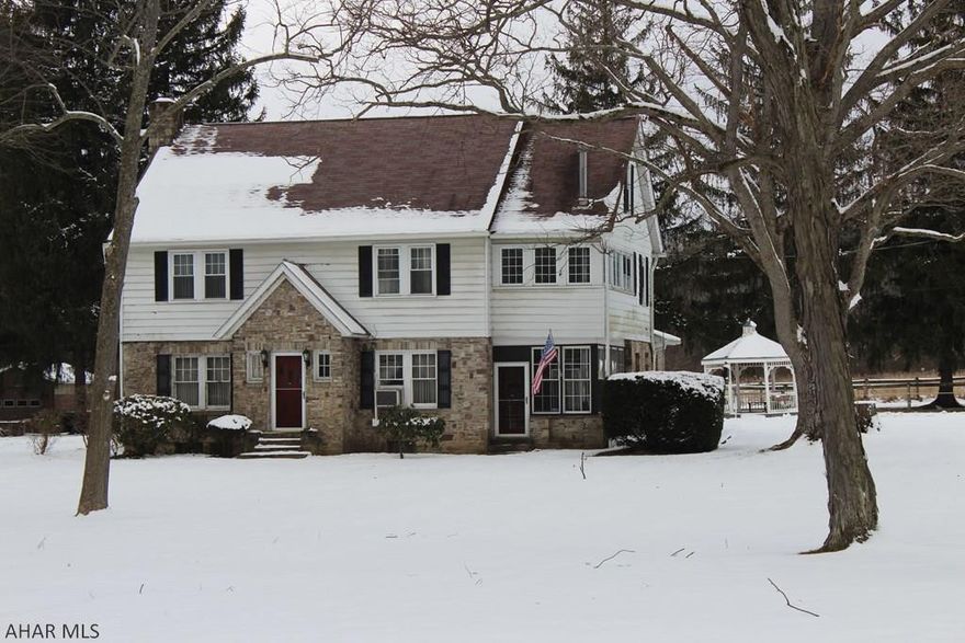 Charming country home w/ a 9 stall horse stable, corral & pasture,which sits on 14 acres.The kitchen: cast iron stove, hidden spice rack& built in buffet. 3 bedrooms w/ potential of a 4th, by changing out the game rm.  One full bath on the 2nd floor & 2 half baths on the first & master bedroom, which is considered the powder room.  The master bedroom has a sitting rm with a balcony that looks over the sun room below. Across from the full bath is a laundry shoot, the basement has a standing shower  & root cellar. A generator that connects to the first floor for your convenience.  Enjoy the gazebo or start a fire in the built in stone fire pit. Fishing & Hunting near by.  Close to Historic Downtown Bedford, Shawnee Lake, Indian Lake & Blue Knob Ski Resort. Listed at appraised value.
