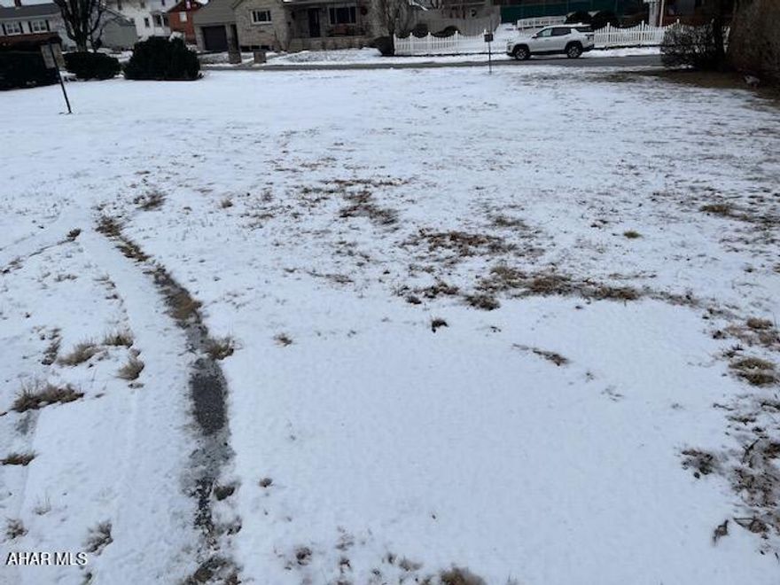 These two vacant lots may be sold with the office building at 1528 Pleasant Valley Blvd.  Lots are level, unpaved and located behind that property.