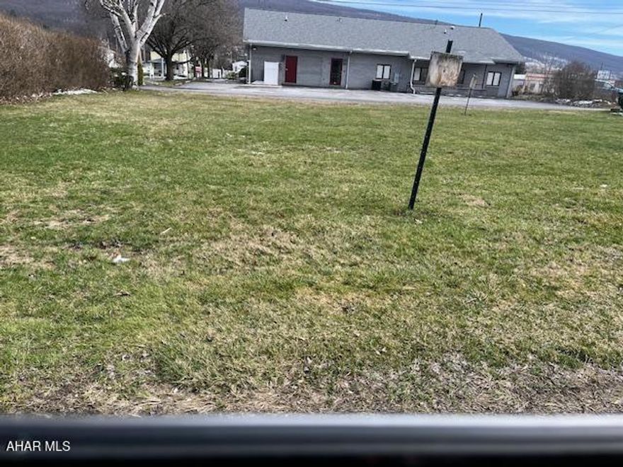 These two vacant lots may be sold with the office building at 1528 Pleasant Valley Blvd.  Lots are level, unpaved and located behind that property.