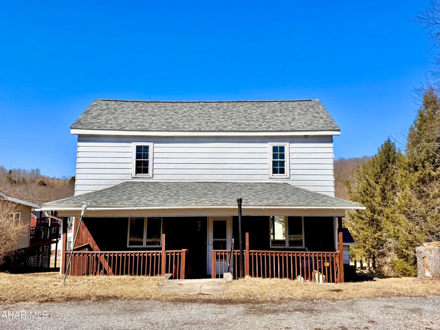 If you're looking for a home with space outside and a garage to tinker in, this is the home for you!  This home sits on a double lot on a dead end road in the small town of Dysart.  The covered porch welcomes you into this fixer's dream.  With a little bit of Imagination, elbow grease, and effort, this could be the property of your dreams.  The upstairs currently has 3 small rooms, but could be reconfigured into 2 rooms and a bathroom!  The Full Bath is on the Main floor as well as Laundry.  There is so much potential waiting to be tapped into it!  Let your visions run wild while making this your own! It would also make a great investment property with a little work.