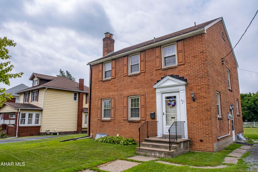Charming two-story brick home ideally located directly across from Mansion Park in Altoona. This inviting residence offers a spacious open-concept living and dining area, highlighted by beautiful hardwood floors and a cozy fireplace—perfect for relaxing or entertaining. Upstairs, you'll find three comfortable bedrooms and a full bathroom. Additional features include off-street parking and a convenient storage shed. With quick access to major highways, including I-99, this home offers both comfort and convenience for commuters.