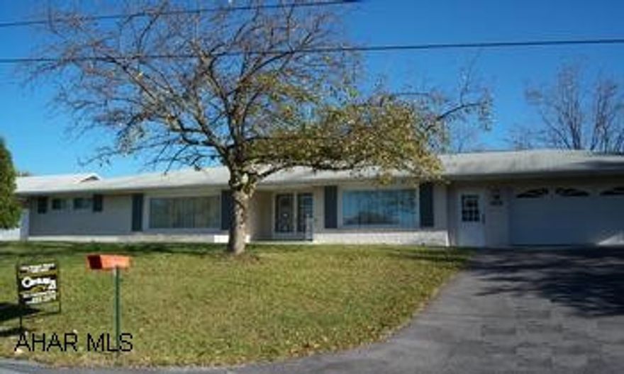 White brick 3 bedroom, 2 full bath ranch on corner lot. Large eat in kitchen with oak cabinets, formal dining room, family room with fireplace, tiled baths one with a jucuzzi tub, large rear deck, fenced back yard, 24x14 shed, paved driveway, and attached 2 car garage.