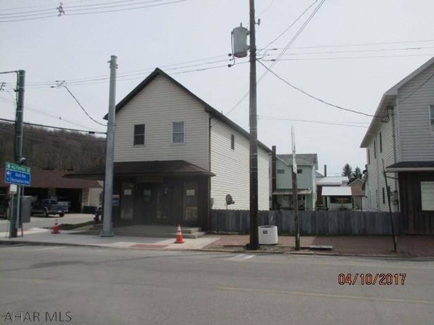 First floor is currently rented as commercial rental space.  2nd floor consists of 2 apartments. Heat and electric is separate for each unit and the commercial unit.