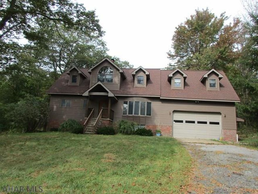 Large 6 bedroom home on 6 acres off of Coupon Gallitzin Road.  Great opportunity to own a home in a lovely country setting.