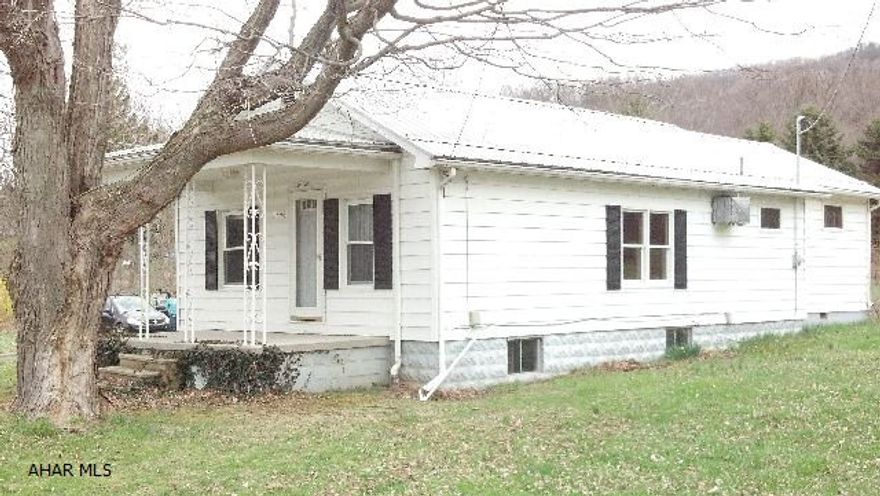 Absolutely adorable!  Many updates, furnace, roof, hot water tank, and more.  Move-in condition- previously appraised much higher- a steal at $58,900!  A 2 bedroom home, but depending on use of rooms, you could easily have a 3rd bedroom.  Won't last!