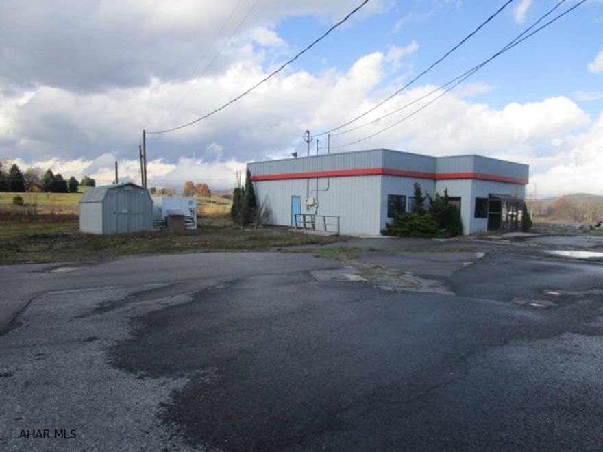 High visibility corner lot with 5.73 acres. Site is situated at the corner of State Route 56 and 220, I-99 is situated at the rear w/ full visibility and exposure from I-99. Interstate exit ramp located at the property, Wal-mart Distribution Center across the street and high truck traffic. Excellent location for a truck stop, convenient store, restaurant or other commercial retail business.