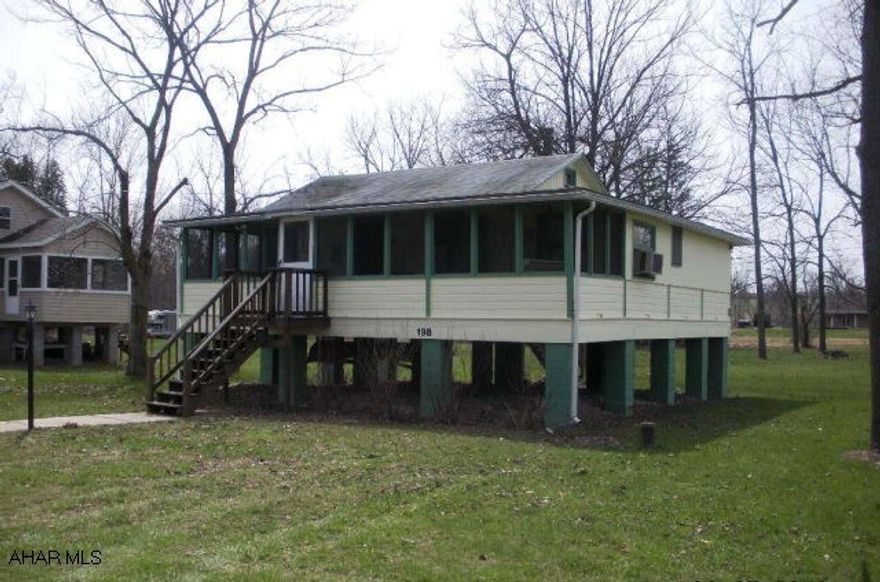 SUNSHINE BEACH COLONY; Cute SEASONAL cottage along Dunnings Creek.  Screened-in front porch w/swing.  Raised up to protect from flooding.  Updated circuit breaker & original wood inside. $100 yearly camp dues.  Listed in time for you to put your Kayak in the creek and enjoy! Camp restrictions. Don't miss out on any of this summer's fun in your own family camp.