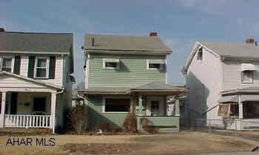 Tuckahoe Park area- first floor powder room, 2 car detached garage and covered deck and front porch. Property sold "As Is"