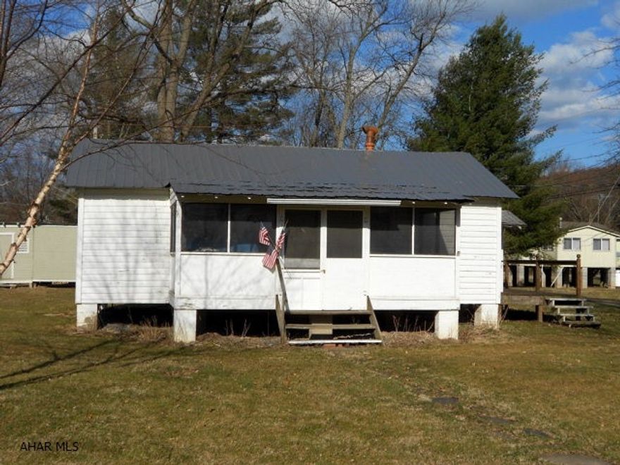 If you are looking for a weekend retreat at a great price, make an appointment to view this cottage located in Camp Sunshine! Lots of furniture and other items included.