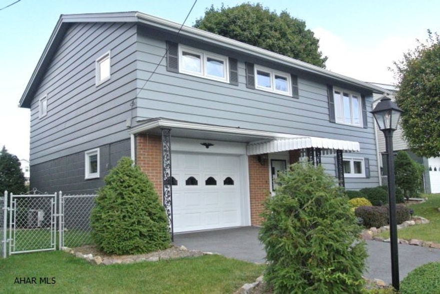 If you have been looking for a Really Nice home in a Very nice neighborhood.....I found it for you here on South 10th st....A great location with many beautiful modern homes.   And....this Meticulous 3+ bedroom, 1 1/2 bath home has many modern amenities, its well built, cared for, and move in ready!   This home features, central a/c, quality new windows, new paint, modern Kitchen, deep closets, all your appliances, and tremendous lower family room that walks out to your semi private fenced rear yard!  This home just offers so much...from beautiful landscaping to the large windows allowing through the natural sunlight.   It is priced to sell!!!!