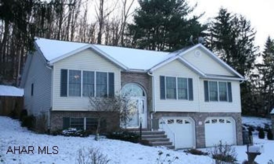 Vinyl/Brick Raised Ranch in ideal residential neighborhood. 3BR/2 full baths, custom kitchen w/breakfast nook, DR, LR w/gas fireplace, cathedral ceiling. Lower level provides additional 374 sq. ft. of living space with 13x21 family room and 9x10 den. Back yard has privacy fence. Nice landscaping.