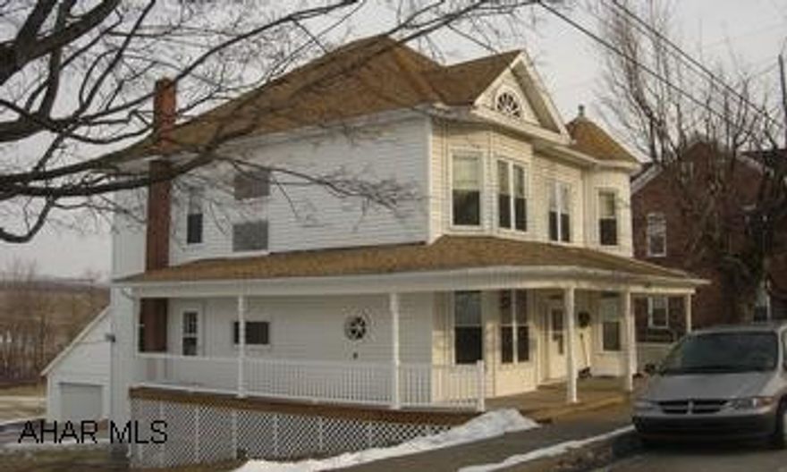 2-story 4 bedroom 1.5 bath home on .6 acre Restored turn of the century 4 bedroom home with newly finished wrap-around porch.  Nice hard wood floors, large rooms with high ceilings, bay windows, and a victorian feel.  New furnace, 2 car garage, with additional off-street parking all located on a large lot in New Paris.