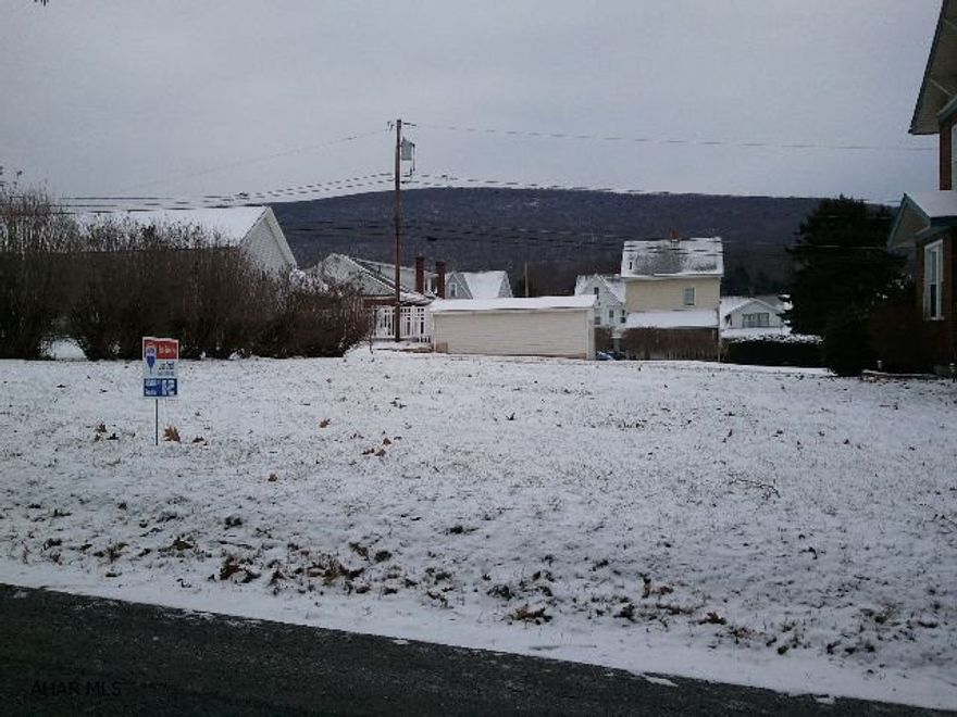 Nice city lot in the East End. I put an information box on the lot that has a sample home that could be built on this lot. Total estimated price is about $156K. This includes the lot, excavation, tap on fees, and a 2 story, 3BR, 2.5 bath home. S & A Homes supplied the estimate. Setbacks are - front-15', sides-20', back 30' for a house and 7' for a garage.