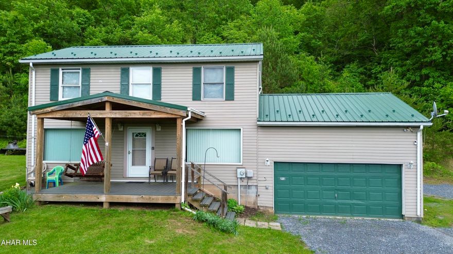 Discover this well-maintained home nestled in the Northern Bedford School District, situated on 3+/- acres bordering PA State Game Lands. The main floor features a spacious living room, dining area, kitchen, convenient half bath, and direct access to the attached garage. Upstairs, you'll find three bedrooms and a full bathroom. The partially finished basement offers a recreation room and additional storage space. Outside, you will find a covered front porch, which provides stunning views of the scenic countryside. The setting of this property provides an excellent place to get away from the hustle and bustle of life and enjoy the great outdoors.