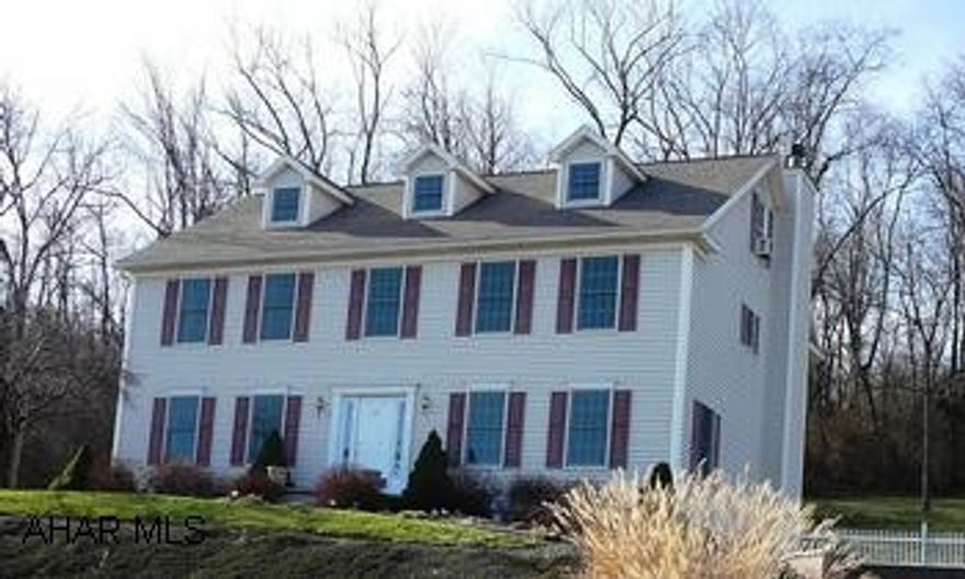 PRISTINE HOME FEATURES SPACIOUS ROOMS THROUGHOUT.  LARGE KITCHEN WITH ISLAND & APPLIANCES, MASTER SUITE HAS JACUZZI TUB AND LARGE WALK-IN CLOSET.  INFORMAL AND FORMAL DINING.  GAME ROOM IN BASEMENT.  HARDWOOD FLOORS, CENTRAL VAC, LARGE DECK, BRICK RETAINING WALL.  MANY AMENITIES.