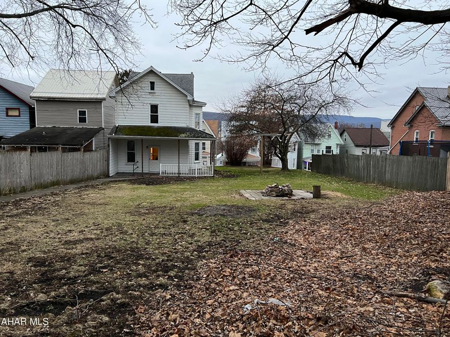 First Time Home Buyers and Investors!!!  Make your way to this solid home.  This home boasts 3 bedrooms plus a heated attic that could be a 4th!  A bonus room off an upstairs bedroom would make a great office or nursery!!!  This home has a newer roof, furnace, hot water heater, and updated electrical.  All of this in addition to a beautiful flat yard, with a 5 car garage!!!  Yes, a 5 car garage!!!  Off street parking in the back of home!!   Investors, potential of two sources of rent! (home and garages!)  Garage floors are all cement.  Only main large garage has power.   Hurry!!  This wont last long!!!!