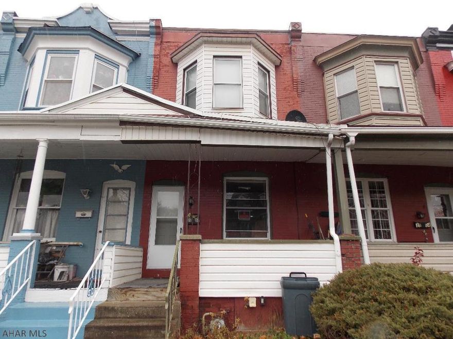 Seller recently updated the electric and rebuilt the back wall (exterior).  Add your personal touches and this would be a great starter home or investment property.  The brick walls give the home a big city feel and the kitchen has been updated as well as some new windows.  Furnace & Water Heater are newer and electric service is brand new.  Low taxes, low price - this home is cheaper than renting.