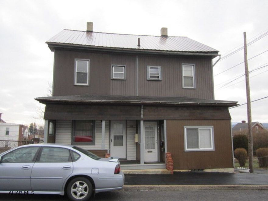 5 unit apartment building. One 2 bedroom 4 efficiency apartments. Two bedroom unit is partially renovated. Building has metal roof and mostly all replacement windows. There is a rear tenant parking lot.