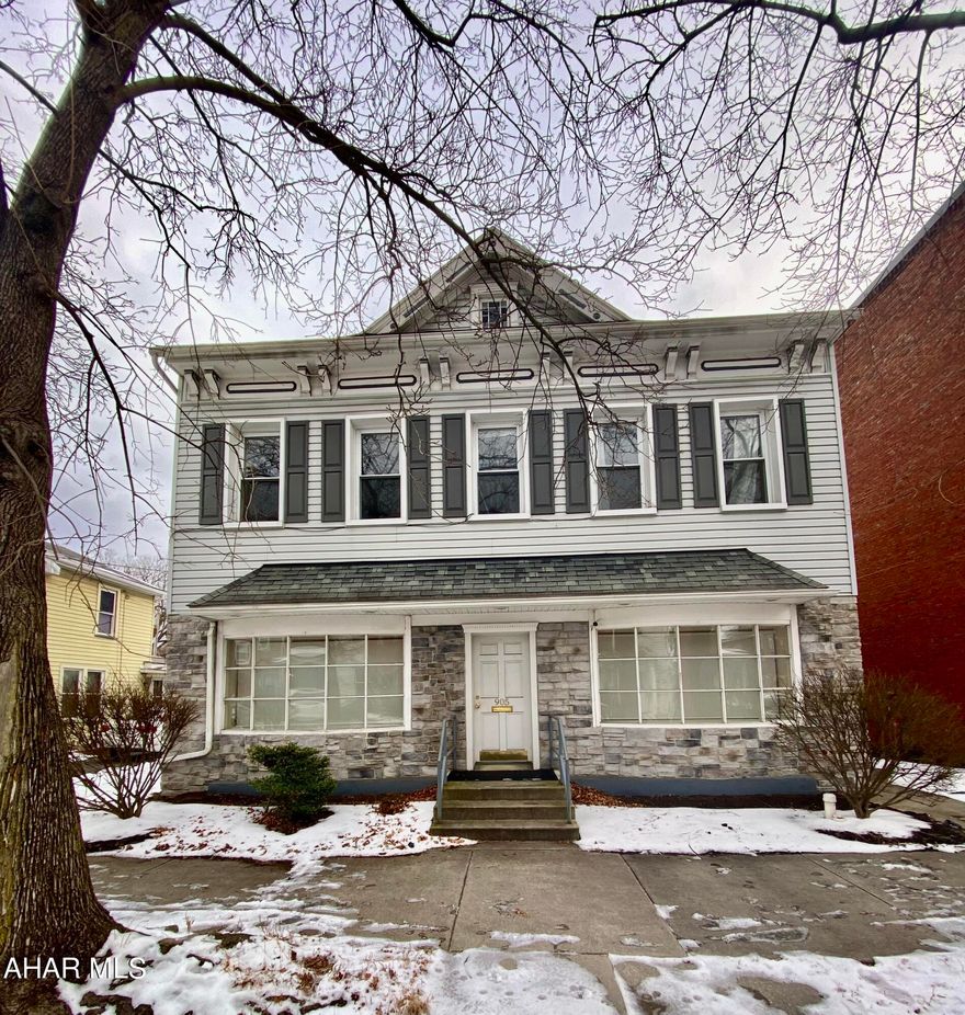 Ideal location for a medical office or business office, located close to downtown and other professional offices as well as close to the hospital. The first floor boasts a reception area, a waiting room, two individual offices, a half bath, and break room. Could be used for one business or multiple businessess with several outside access points. This property offers the convenience of a large parking lot for off-street parking and a handicap entrance. The second floor is set up as a three-bedroom apartment; but could also be used as part of a business or as the apartment rental. It has an outside access as well as an interior access. A must see, don't miss out on this business opportunity.