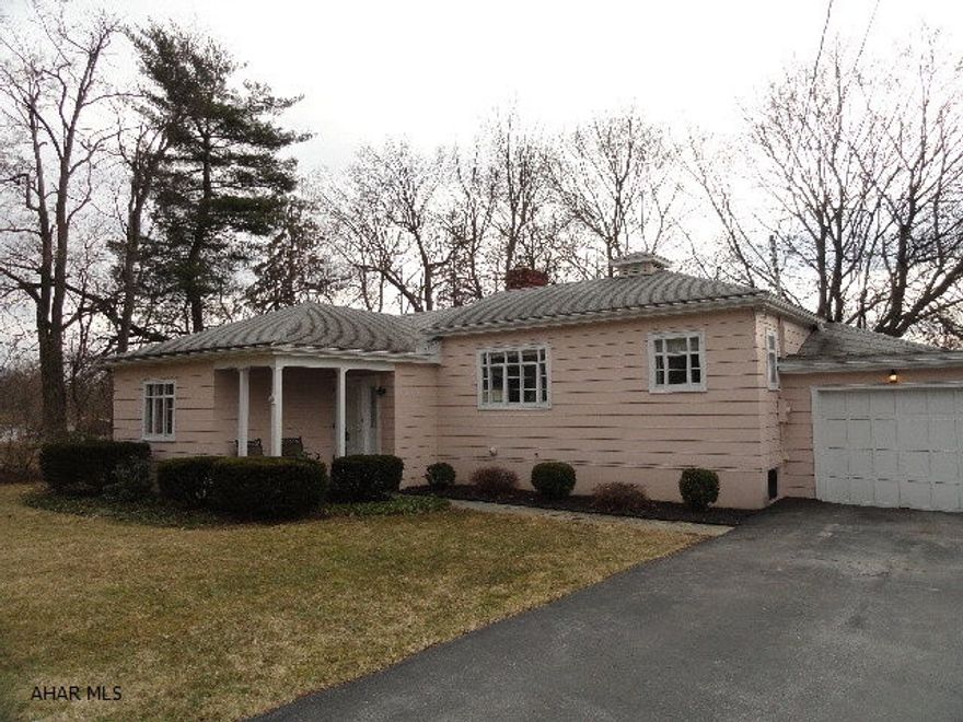 Charming 1 story on Sylvan Drive, Hollidaysburg. Two bedrooms, 2 full baths, master w/walk-in closet. Living room w/original built-ins. Beautiful Hardwood throughout/under carpeting. Two steps up to dining room and quaint eat-in kitchen. Possible 1st floor laundry, Large flag stone patio, 1 car garage. All on quiet private lot in beautiful neighborhood.