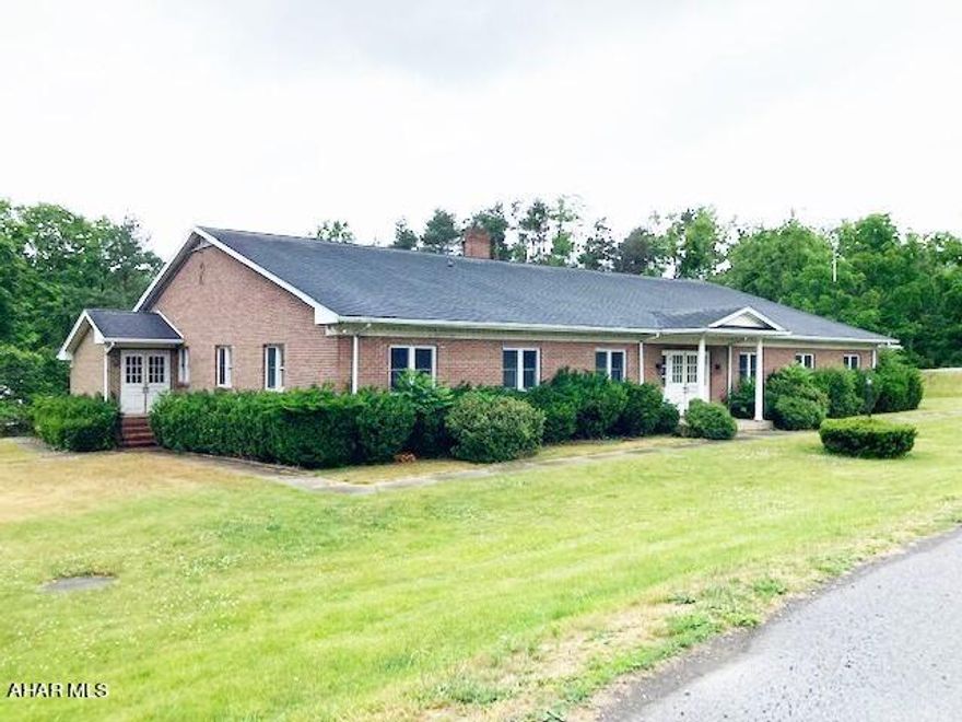 Spacious office building located just of Rt. 22 in Hollidaysburg.   Large asphalt  parking lot.   Building structure is in good condition.  Interior needs refurbished.   Buyer will be required to dig well for water.  Public sewer is available.
A lot of property for the money.