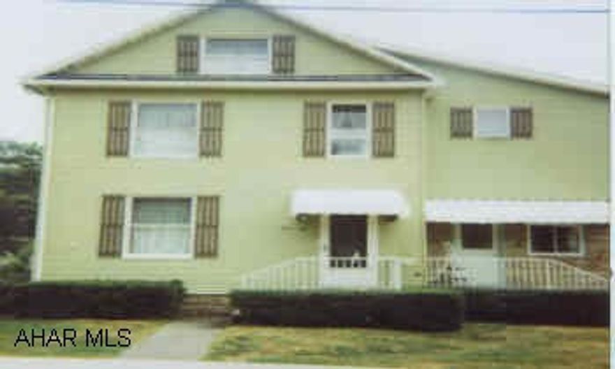 GORGEOUS LARGE SPACIOUS HOME. BRIGHT HUGE SUNROOM. ARCH CARVED POCKET DOORS LR TO DR. EXTRA LOT. FOREST HILLS SCHOOL DIST.