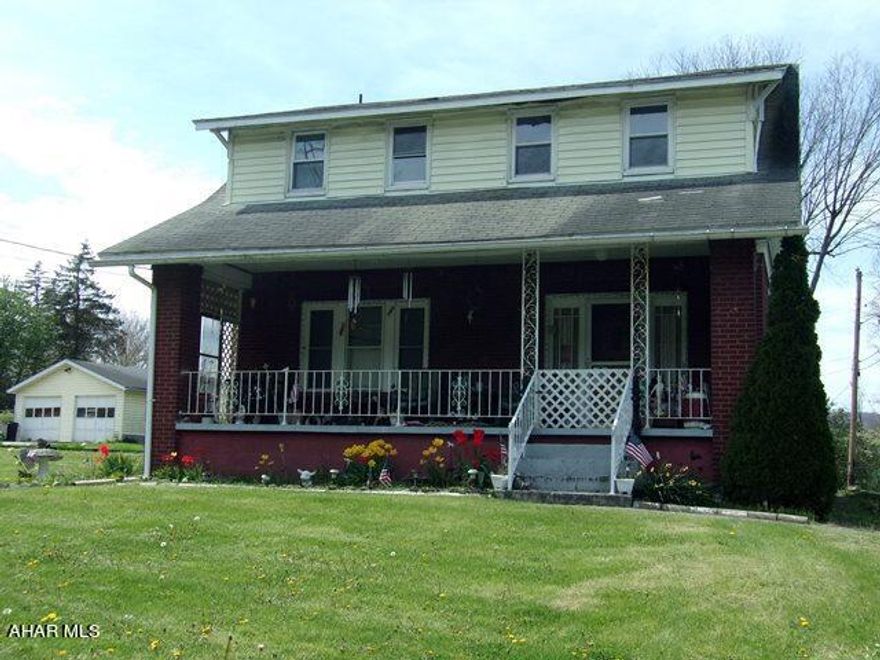 Good Bones! This 1928 brick cape cod is a solid build!  It retains many charming features - like original oak doors with glass knobs - beautiful, wide, oak baseboards and window frames - all in wonderful condition.  Most of the windows have been  upgraded.  The solid, wood floors need some work to make them shine again.
There is a large eat-in kitchen with original built-in cupboard.  Host dinners in the separate dining room with access to kitchen and original glass paned french doors into the living room.  Lots of light in this living room which adjoins the foyer with it's lovely oak front door and immaculate staircase leading to the second floor.
4 nice sized bedrooms upstairs and a full bath.  Walk up attic for easy storage.
Length-of-house, covered porches front and back to enjoy morning coffee or evening sunsets - gated to keep small children and pets safe.