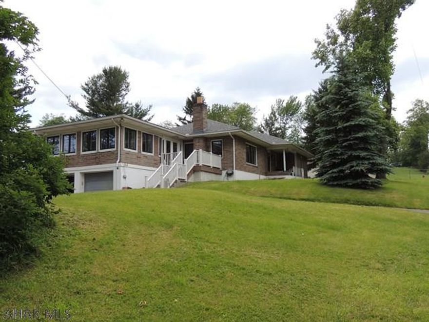 Call to see this spacious 3 bedroom 1 story home on .41 acres in Loretto.Large 4 season room w/ pellet stove, original hardwood flooring, updated bath,  deck, 2 car integral garage, shed, play set  and a 14.6x16 RV garage. Complete this great home with a country setting.