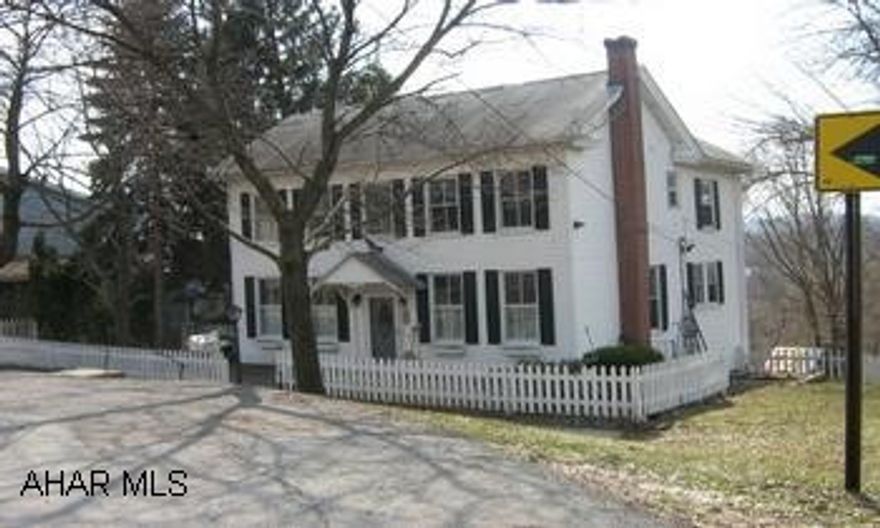 Colonial 2 1/2 story, great rear and side view. New kitchen & bath. Remodeled music room or den/dining room. Awning for rear deck.