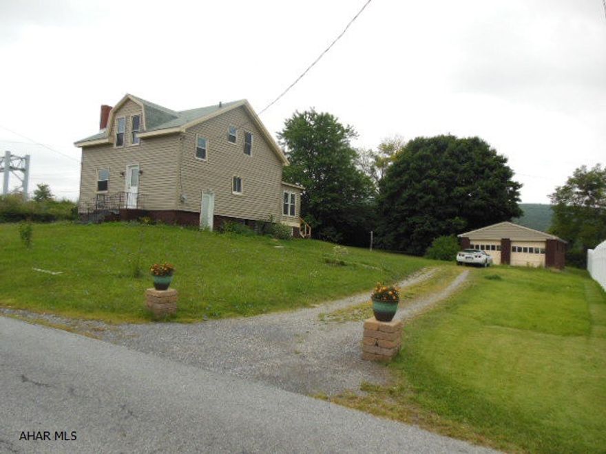 REDUCED!! Better than renting!  Beautifuly remodeled home in Garden Heights on a large corner, somewhat level lot with a 2 car detached garage. A newly added first floor laundry room and 1/2 bath make this very comfortable and convenient floor plan. There is even room for a pool out back. New triple pane windows, doors, Cherry Kitchen w/island, Stainless Steel appliances, High Efficiency GFA furnace (90%), 100 amp breakers, ceramic tile floors & refinished hardwood floors, siding & more. Handy location - real close to shopping, pharmacies, and grocery stores. Go ahead and compare what you get!! Call today!