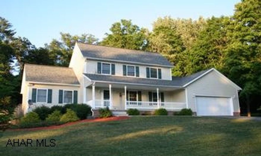 Traditional style 2-story home on 2.038 acres with country setting and woodland views. Traditional style 2-story home on 2.038 acres with country setting, woodland views. Architectural design; Master suite on 1st floor, custom kitchen w/dining area, main-level laundry. Central vac, hardwood floors, covered front porch, two-tier covered deck in back; landscape pond. Ideal work shop off garage. Finished family room and den in basement. Underground utilities.