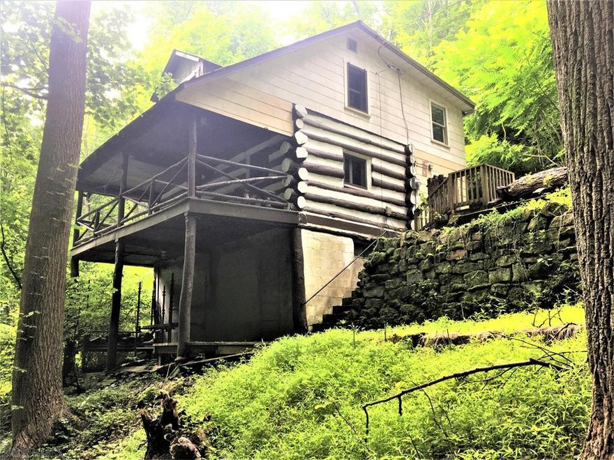 If you are looking for seclusion and quiet , you have just found it. This sweet log cabin is nestled in the woods with all the furnishings included, just ready for you to step in. Close to Lake Gordon, 12 acres , great for hunting , mature timber and much more!