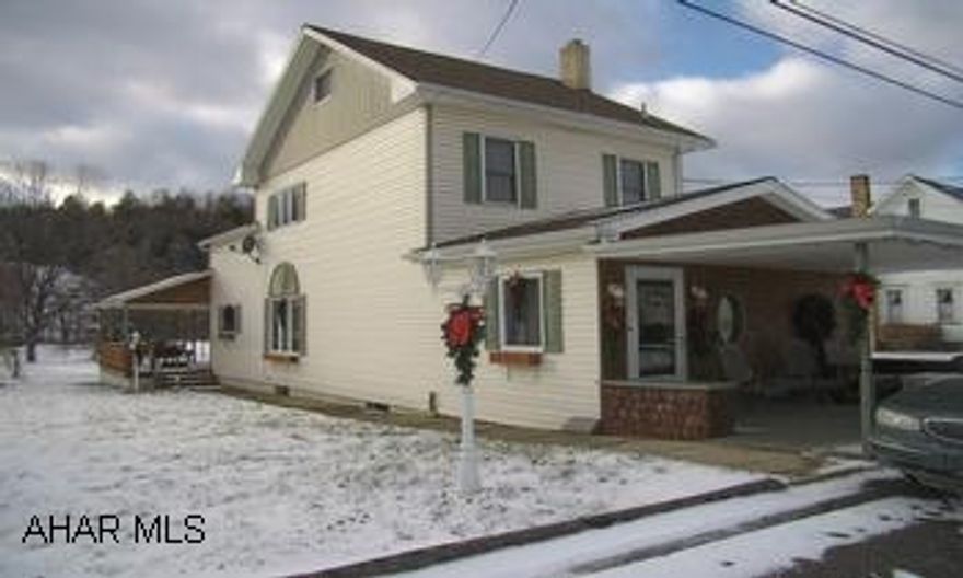 Great 2 bedroom home with large spacious kitchen - oak cabinets - naturally lit eating area.  New appliances, treyed ceiling in kitchen & Dining Room.  2 Full Baths, large walk in closet (room with laundry hook up - could be 3rd bedroom).  Nice lot, deck! Great 2 bedroom home with large spacious kitchen - oak cabinets - naturally lit eating area.  New appliances, treyed ceiling in kitchen & Dining Room.  2 Full Baths, large walk in closet (room with laundry hook up - could be 3rd bedroom).  Nice lot, deck!  Take a look at pictures.  Seller's pay $350/year - Flood Insurance.  Water/Sewer $54/month.  Electric $60/month.  Propane $50/3 months.  Oil Tank each year.