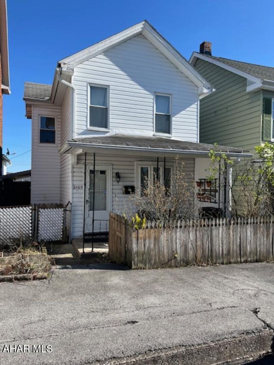 Sweet two story in quiet area.  Updated eat in kitchen with newer cabinets, laminate flooring,  Large living room, first floor combination laundry and 1/2 bath.   Second floor features 2 bedrooms (one is captive) and a full bath.  Exterior features both front and rear porches.
