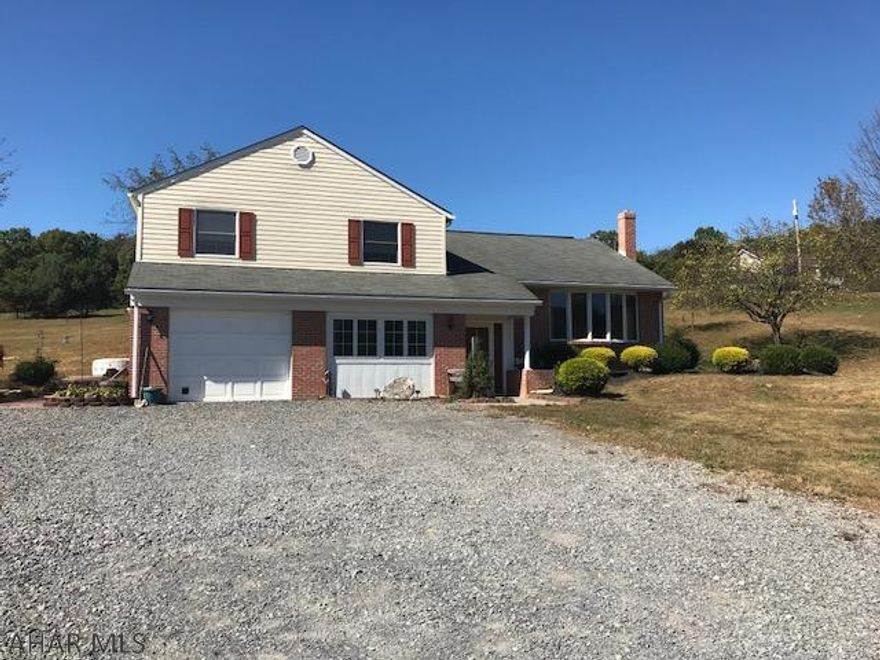 Beautiful multi-level home on almost 2 acres. Home sits off 220 - centrally located between Bedford and Cumberland.  This home has 3 bedrooms, 2 full bath on main floor, finished family room and 3/4 bath on ground floor. One car attached garage, decorative fish pond and 2 Esh buildings. Beautiful area and a great home.