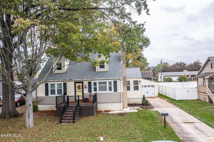 Don't miss your opportunity to own this Hollidaysburg borough charmer on a nice level lot.  4 bedrooms - 2 on the main level - and 2 full baths on a quiet tree-lined street.  Enjoy the large eat-in counter kitchen with connecting dining area.  This home has beautiful quartz countertops in the kitchen and bathrooms.  Brand new roof installed by Roof Works USA summer 2024 with a lifetime transferable warranty.  All new windows throughout.  Beautiful converted manually lit gas-log fireplace which can be converted back to a warm woodburning unit in the cozy living room.  There's a finished family/game room in the basement.  The newer front porch has durable composite decking.  Also included is a barn-shed and a new partially-completed shed housing a never used hot-tub that surrounds a cozy open patio area.  Make this Cape Cod charmer your forever home.