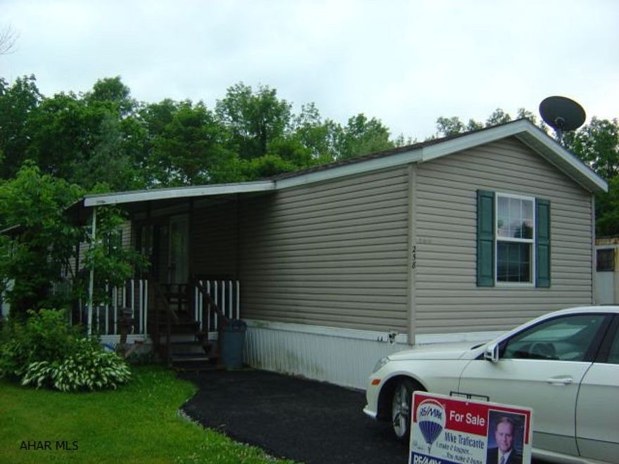 2002 Skyline 14 x 70 shed and porch. Lot rent $435.00 includes water/sewage. Cross Keys Village.